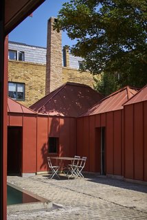 Red Tin House That Makes the Most of Space and Light - Photo 9 of 9 -