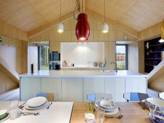 Take a Modern British Holiday in a Gleaming Cantilevered Barn - Photo 5 of 10 -