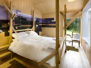 Take a Modern British Holiday in a Gleaming Cantilevered Barn - Photo 8 of 10 -