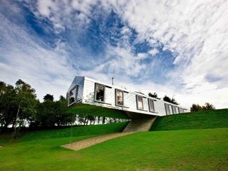 Take a Modern British Holiday in a Gleaming Cantilevered Barn - Photo 10 of 10 -