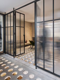 Transparent Perforated Circles Bring Light and Movement to This London Terrace House - Photo 8 of 11 -