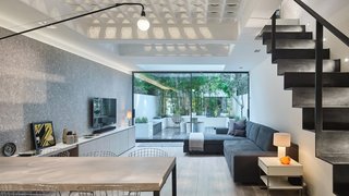 Transparent Perforated Circles Bring Light and Movement to This London Terrace House - Photo 2 of 11 -