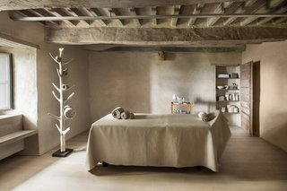 A Tree-Filled Spa That Brings Warm Modernism to a 900-Year-Old Tuscan Village - Photo 1 of 8 -