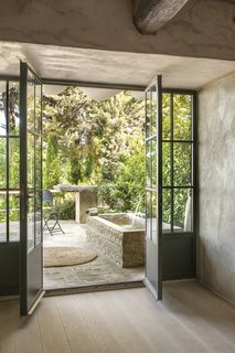 A Tree-Filled Spa That Brings Warm Modernism to a 900-Year-Old Tuscan Village - Photo 3 of 8 -