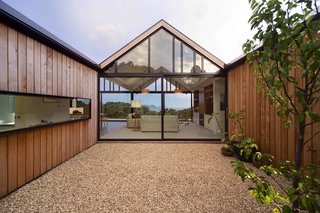 The architect of this contemporary residence in Port Arthur, Tasmania, incorporated a central courtyard as an unusual but intelligent design response to the region's temperate climate.