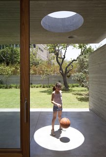 An Architect’s Bright and Airy Family Home Thrives Within a Brutalist Concrete Structure - Photo 4 of 12 -
