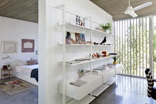 An Architect’s Bright and Airy Family Home Thrives Within a Brutalist Concrete Structure - Photo 9 of 12 -