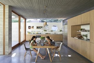 An Architect’s Bright and Airy Family Home Thrives Within a Brutalist Concrete Structure - Photo 11 of 12 -