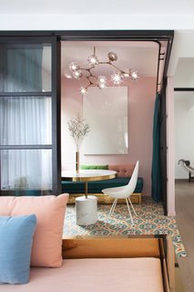 9 Small Spaces With Color - Photo 3 of 9 - When remodeling this Art Deco-inspired apartment in Hong Kong, Lim+Lu combined muted pink, deep blue, and turquoise with ceramic tiles, black-and-white accents, and splashes of gold.