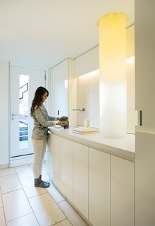 In Boston’s South End, architect Anne Barrett of 30E Design has revamped a laundry room in a traditional brownstone. Illuminated by a bundle of fiber-optic cables, it's more of an art installation than a hub for domestic chores. 