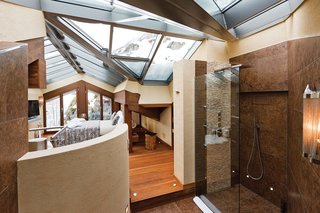 Built into the side of the mountain, Zermatt Peak is an expansive holiday retreat that has an indoor and outdoor jacuzzi, gym, sauna, steam room, and walk-in wine cellar.