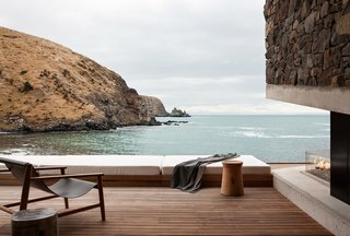 Constructed predominantly with locally quarried stone, steel, poured concrete floors and a turf roof, the horizontal outline of the property harmonizes beautifully with its rugged natural surroundings. The house also has an outdoor terrace with a pool and fireplace, where you can enjoy a cup of tea and take in plenty of fresh air.