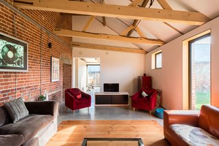 A Suffolk Barn Home With Soaring Ceilings Listed at $1.95M - Photo 4 of 9 -