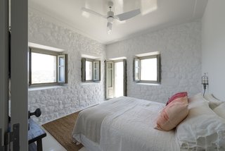Stay at a Greek Island Villa Among the Ruins of a 14th-Century Castle - Photo 8 of 12 -