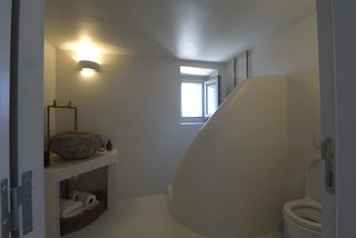 Stay at a Greek Island Villa Among the Ruins of a 14th-Century Castle - Photo 9 of 12 -