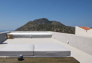 Stay at a Greek Island Villa Among the Ruins of a 14th-Century Castle - Photo 11 of 12 -