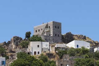 Stay at a Greek Island Villa Among the Ruins of a 14th-Century Castle - Photo 2 of 12 -
