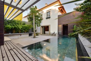 An Architect Renovates His 1920s Home in Portugal, While Preserving the Exterior Shell - Photo 5 of 15 -