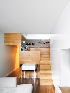 A mattress bed sits on the top of seven steps in Michael Pozner’s abode in Greenwich Village, which measures just under 500 square feet.