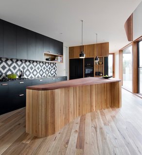 How to Design a Kitchen That’s Ideal For Entertaining—and Shop Our Picks - Photo 1 of 9 - The eye-catching tile backsplash is by Popham Design.
