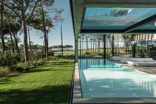 A Pool With a Glass Bottom Hovers Over Another at a House in the Portuguese Riviera - Photo 7 of 12 -