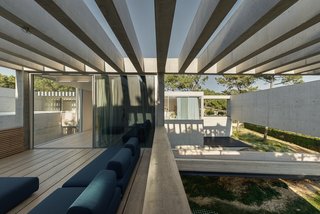 A Pool With a Glass Bottom Hovers Over Another at a House in the Portuguese Riviera - Photo 8 of 12 -