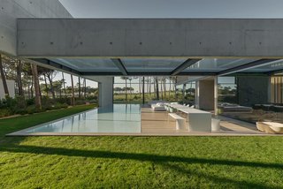 A Pool With a Glass Bottom Hovers Over Another at a House in the Portuguese Riviera - Photo 12 of 12 -