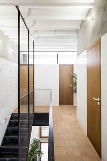 This Double-Height Apartment in
Barcelona Features Historic Details and a Floating Staircase - Photo 5 of 12 -