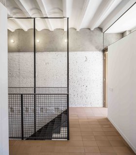 This Double-Height Apartment in
Barcelona Features Historic Details and a Floating Staircase - Photo 6 of 12 -