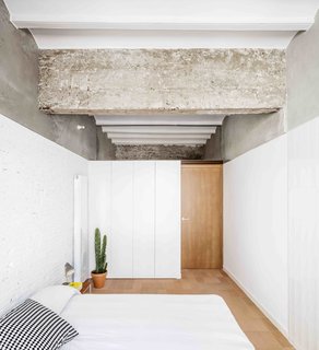 This Double-Height Apartment in
Barcelona Features Historic Details and a Floating Staircase - Photo 7 of 12 -