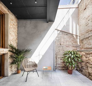 This Double-Height Apartment in
Barcelona Features Historic Details and a Floating Staircase - Photo 8 of 12 -