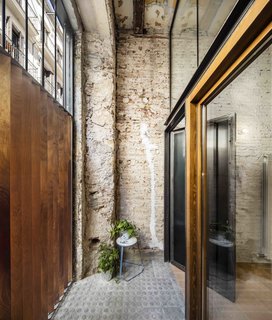 This Double-Height Apartment in
Barcelona Features Historic Details and a Floating Staircase - Photo 11 of 12 -
