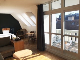With slate-colored walls, plenty of leather and wood in the communal areas, industrial-style decor, and bedrooms with unusual reading-friendly headboards, Hotel SP34 lets you enjoy Copenhagen in style.