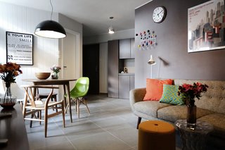 Budget was something that JAAK had to keep in mind when working on their first residential project in 2013. They incorporated full-height storage features close to the entrance and combined the dining and living areas. 