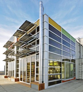 9 Eco-Friendly Homes With Smart, Sustainable Features - Photo 1 of 9 - Designed for close to net-zero energy consumption, architect Vivian Manasc’s colorful rooftop penthouse in Edmonton, Canada, is equipped with solar panels that generate electricity. Waste heat emissions from the elevator core help warm the space passively.