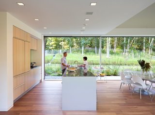 9 Eco-Friendly Homes With Smart, Sustainable Features - Photo 7 of 9 - This family beach home in Montauk in the Hamptons is equipped with sustainable features such as a prefabricated foundation, a geothermal heating and cooling system buried below ground, and non-toxic finishes.