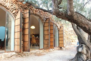 8 Subterranean Homes That Are Out of This World - Photo 6 of 8 - Nestled into an agricultural terrace in Catalonia in northeastern Spain, Casa Cova Blanca is an underground vacation home that draws in tons of light though its large, arched windows. The property is available for rent through Cool Stays.