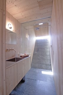 Stay in a Tiny Shingled Cabin in Austria That Resembles a Bird-Like UFO - Photo 10 of 11 -