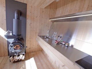 Stay in a Tiny Shingled Cabin in Austria That Resembles a Bird-Like UFO - Photo 6 of 11 -