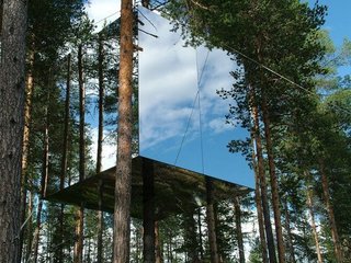 Six designers got together to create the 13-by-13-foot Mirrorcube in Treehotel in Harad, Sweden. The structure is made up of a reflective glass cube that's built around the trunk of a pine tree, which blends beautifully into the surrounding forest. 