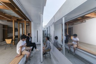 Japanese architect Kosaku Matsumoto revamped the ground floor of a narrow Tokyo residence, replacing a window that frames a dull view of the opposite house with a 6.6-by-8.2-foot mirror that enlarges the space with a reflection of the interiors. "The idea was to abandon the use of this window that had no view, and instead reflect views of the interior space," says Matsumoto.