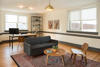 8 Modern Offices That Feel Like Homes - Photo 7 of 8 - Inside a renovated post office in Richmond, Virginia, is the office of digital agency Mobelux. It includes a theater, billiards, and a lounge area in the basement. 