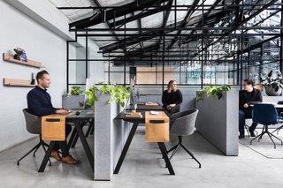 8 Modern Offices That Feel Like Homes - Photo 4 of 8 - An Art Deco warehouse conversion in Melbourne is home to two creative enterprises that share a common boardroom, kitchen, and break space.