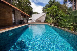 Inspired by Indonesian arts and crafts with a thoroughly modern twist, this eco-friendly resort has two types of villas. Both come with their own private pool, forest views, and warm, earth-toned decor.