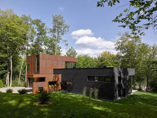 7 Incredible Modern Homes by Canadian Architect Paul Bernier - Photo 1 of 7 - In the winter, the polished-concrete floor, which connects to a large, south-facing opening, accumulates heat from the sun during the day and keeps it indoors at night.