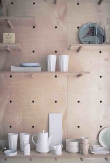 3 Smart Storage Systems Maximize Space in a Tiny Studio Apartment in Budapest - Photo 7 of 10 -