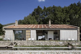 An Abandoned Stable in Spain Is Transformed Into a Sustainable Vacation Home For Rent - Photo 1 of 13 -