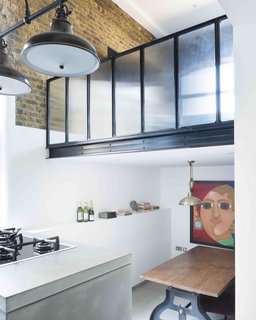 An Old Grain Warehouse on the River Thames Is Transformed Into an Industrial-Modern Home - Photo 4 of 11 -