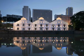 Designed by Asylum and Zarch Collaborative, this converted warehouse along the Singapore River boasts a lobby with vaulted ceilings that puts a spotlight on the original pulley systems that were commonly found in godowns (shown in the cover photo above).