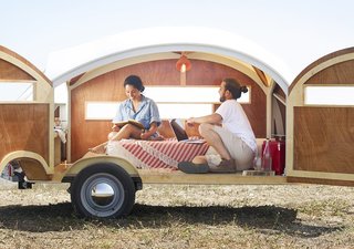 10 Prefabricated or Modular Structures That Use Plywood in Creative Ways - Photo 3 of 11 - A lightweight frame enclosed with taut fabric and sheets of Joubert Okoume marine plywood are used for this 44-square-foot hybrid, prefab-trailer house.